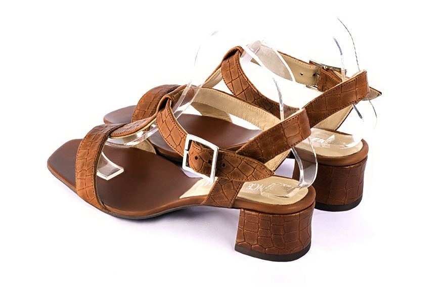 Women's caramel brown elegant fully open instep strap sandals. Square toe. Low flare heels - Rear view